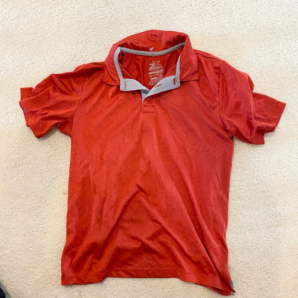 Red performance “golf shirt” size M. Like new.